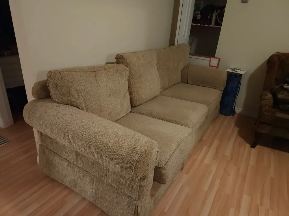 Comfortable Beige Three-Seat Sofa