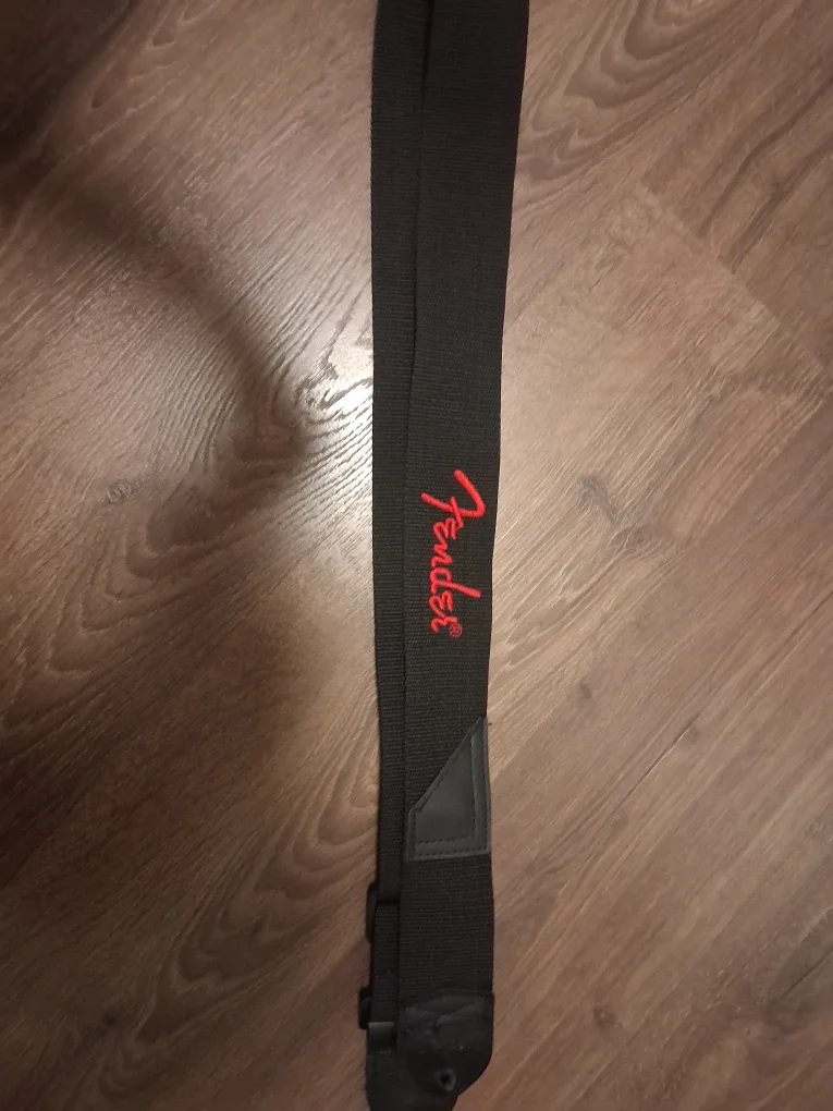 Stratocaster style electric guitar with Fender strap image indicator(4)