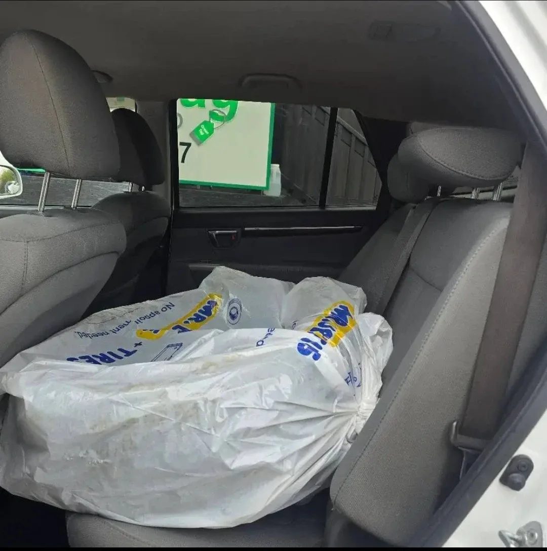 Lease-to-own white Hyundai Santa Fe. image indicator(8)