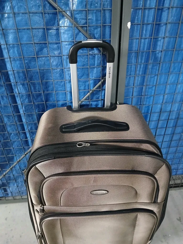Samsonite rolling checked luggage bag image indicator(5)