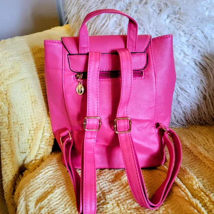 Bright pink backpack purse image indicator(4)