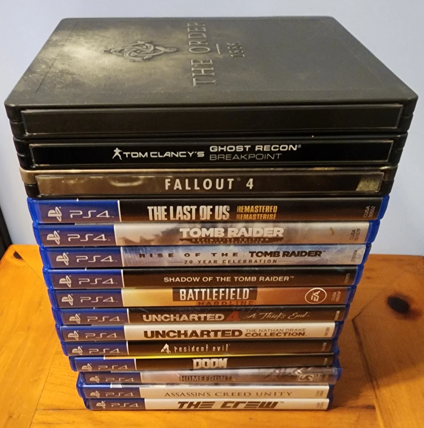 PS4 and Games Bundle - Tomb Raider, Last of Us, & More! - photo 2