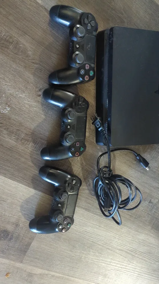 PlayStation 4 (PS4) with 3 Controllers