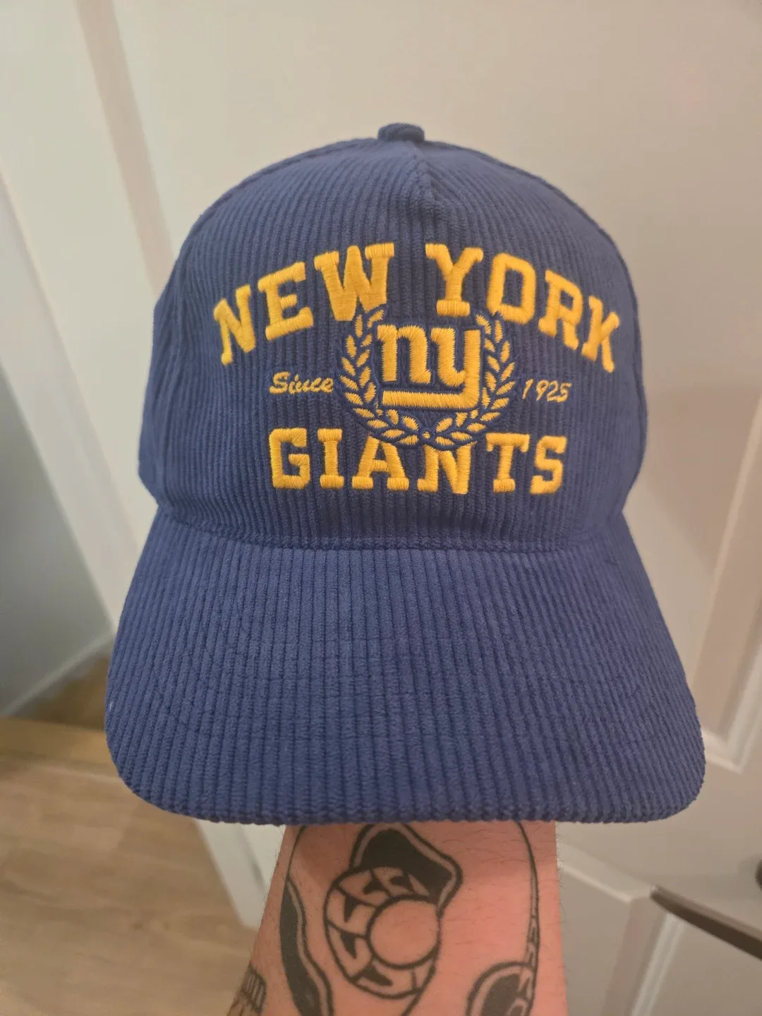 Assorted Baseball Caps: Memphis Hustle, Giants, Celtics