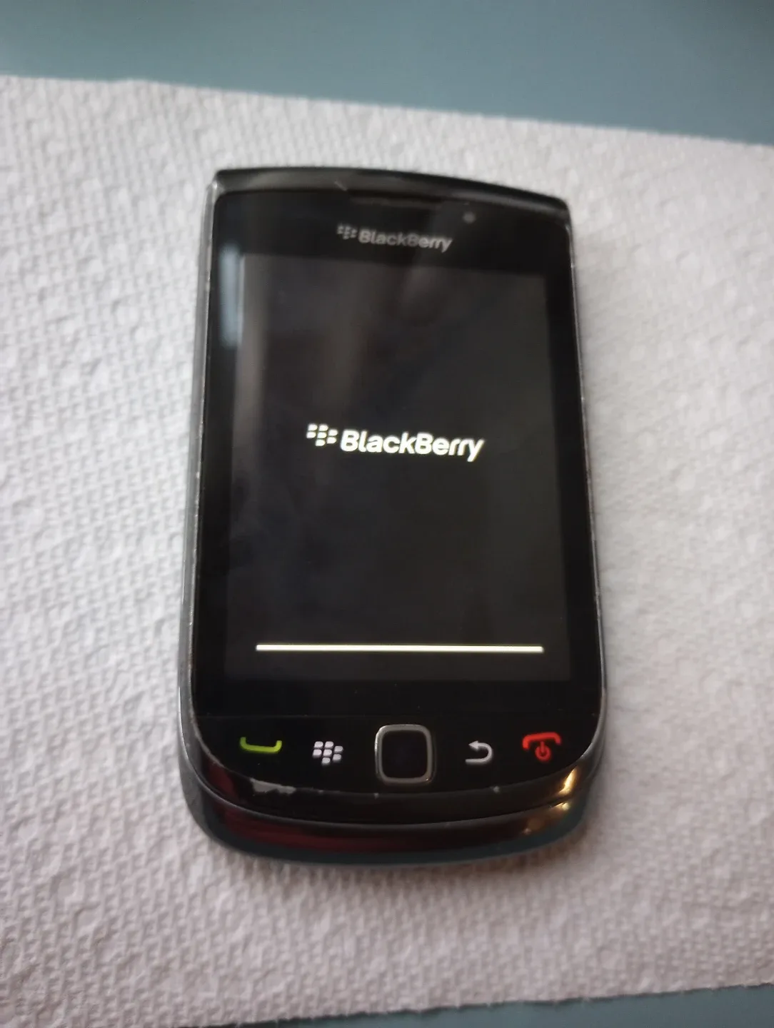 BlackBerry Torch 9800 with leather case image indicator(7)