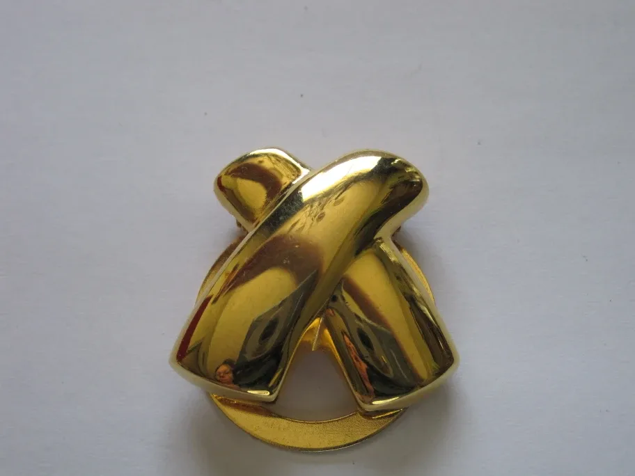 Gold tone brooch