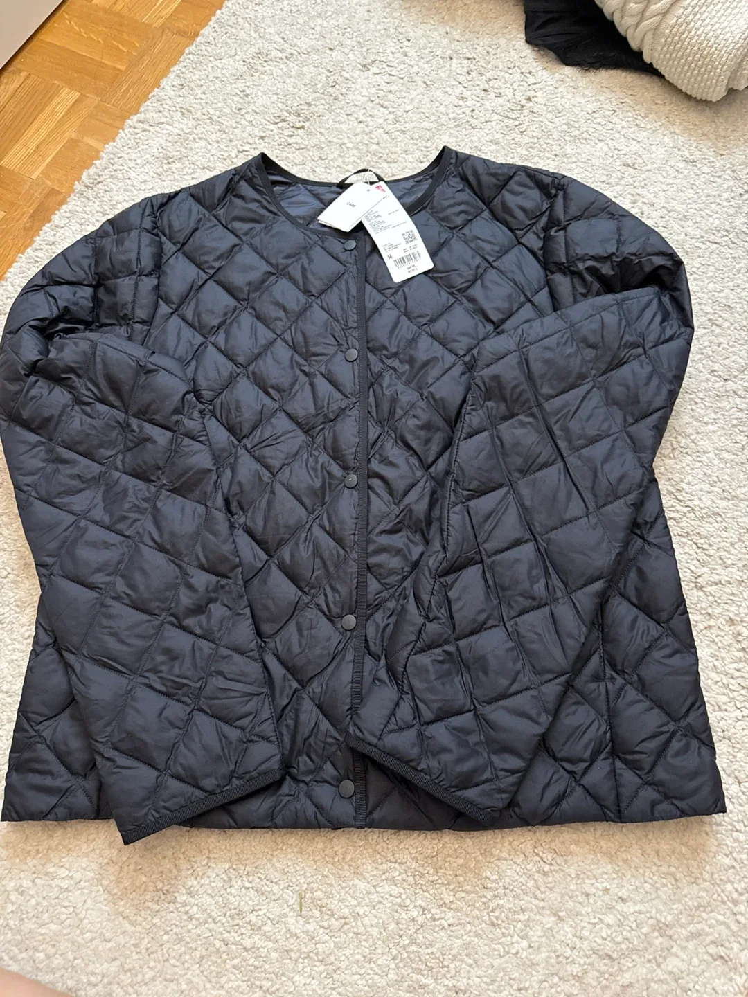 Uniqlo Ultra Light Down Jacket - Size M thumbnail