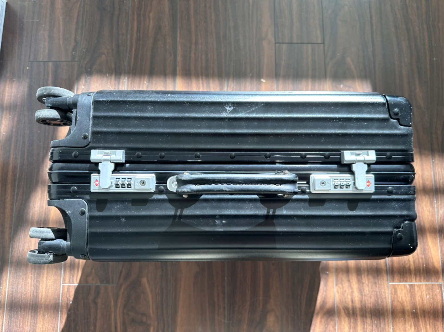 Rimowa Black Carry on Luggage