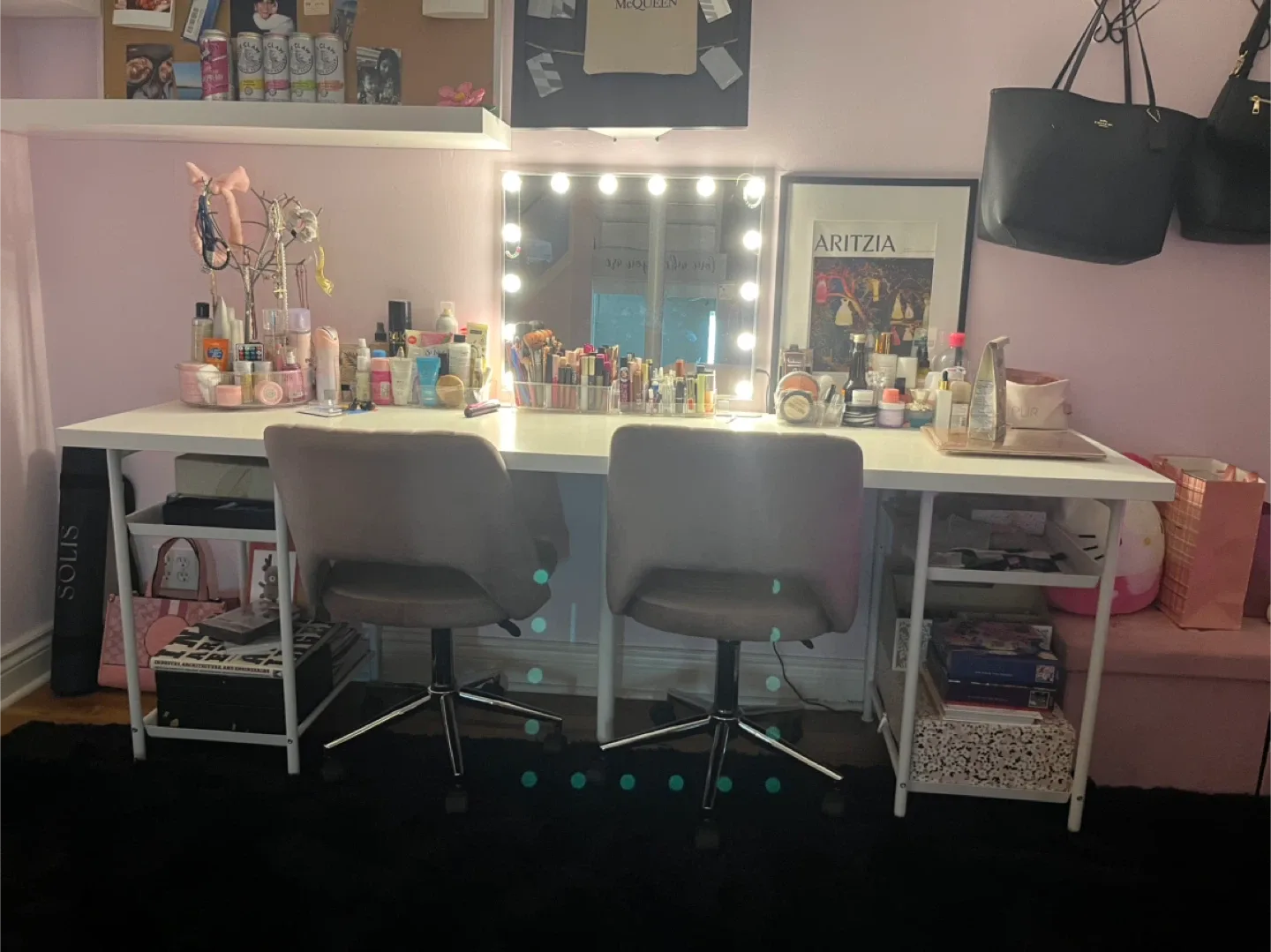 Vanity table with lighted mirror and chairs
