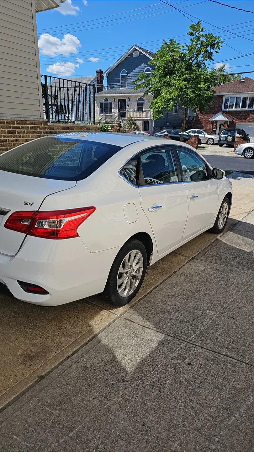 Nissan Sentra - White Sedan image indicator(2)