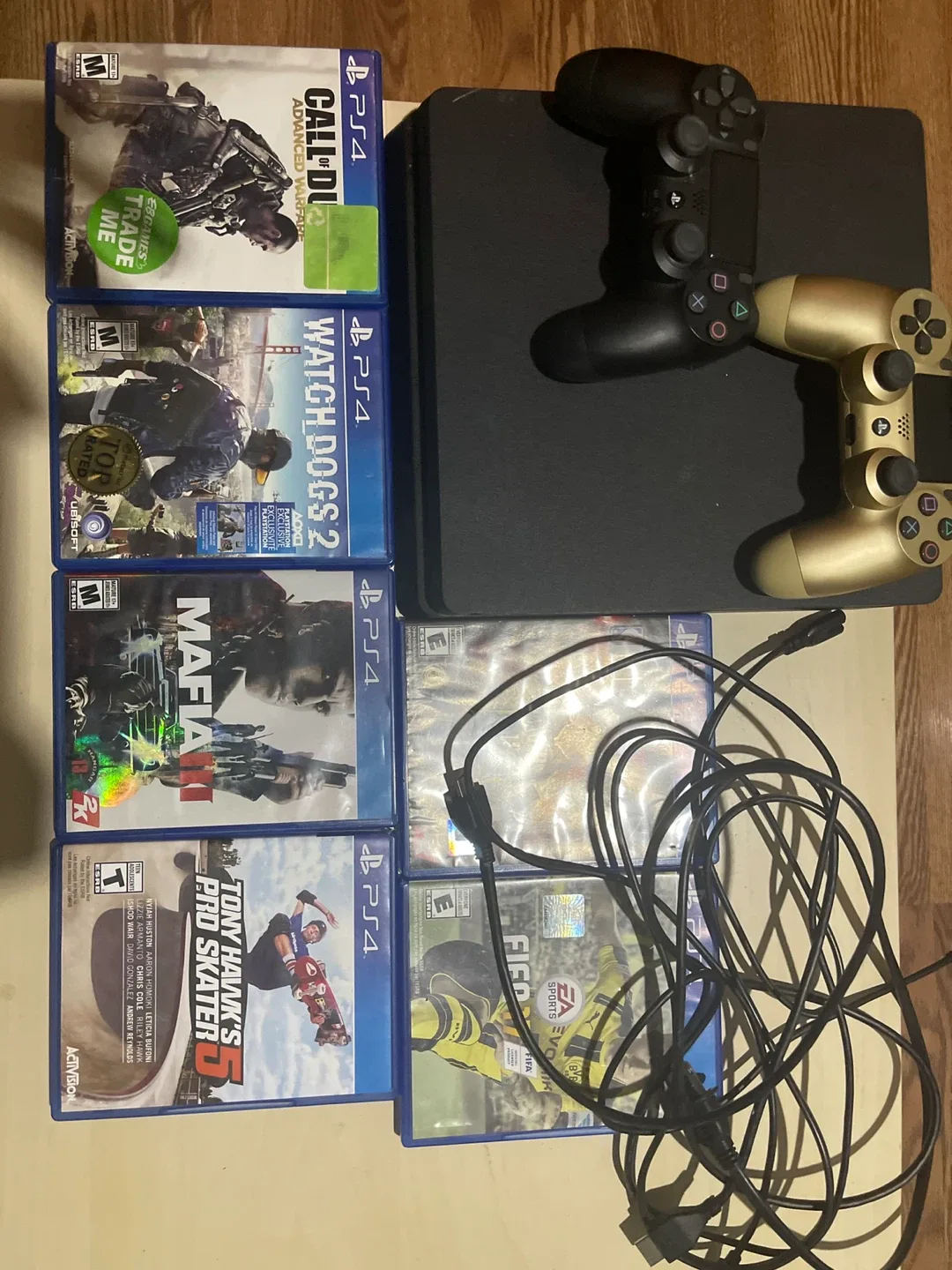 PS4 Console with Games and Controllers thumbnail