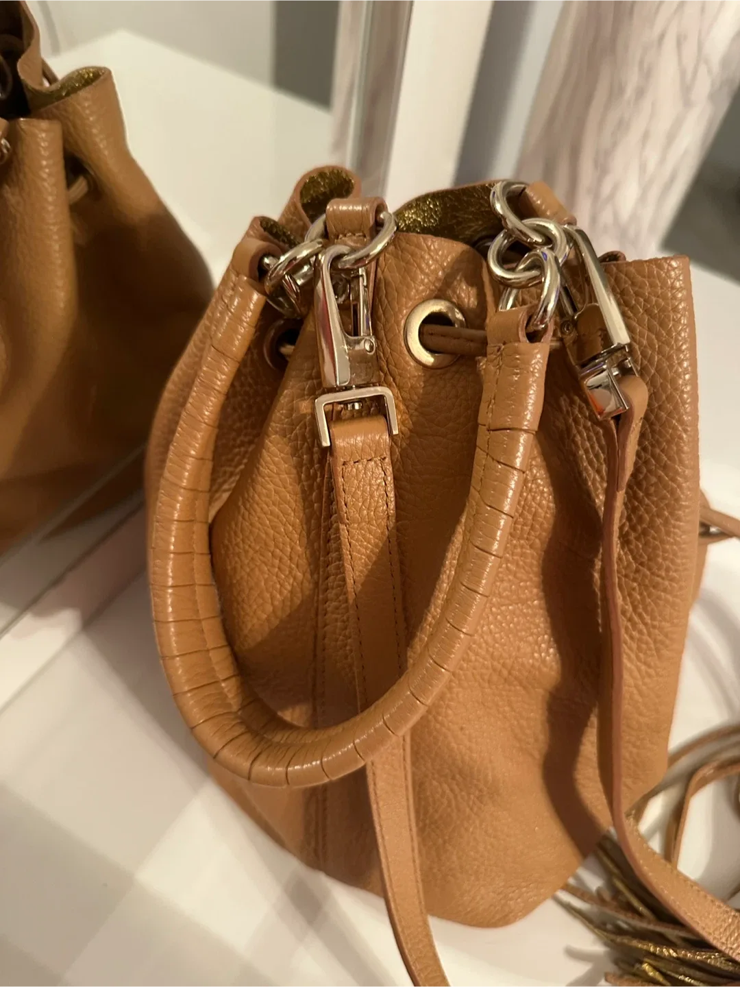 Tan Leather Bucket Bag with Tassels image indicator(6)