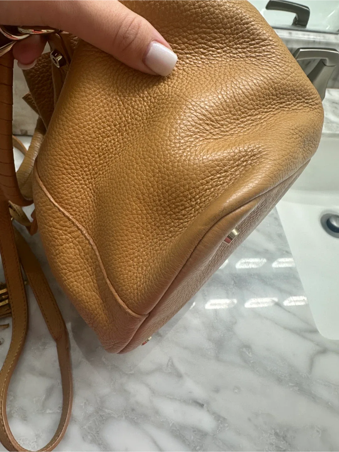 Tan Leather Bucket Bag with Tassels image indicator(3)