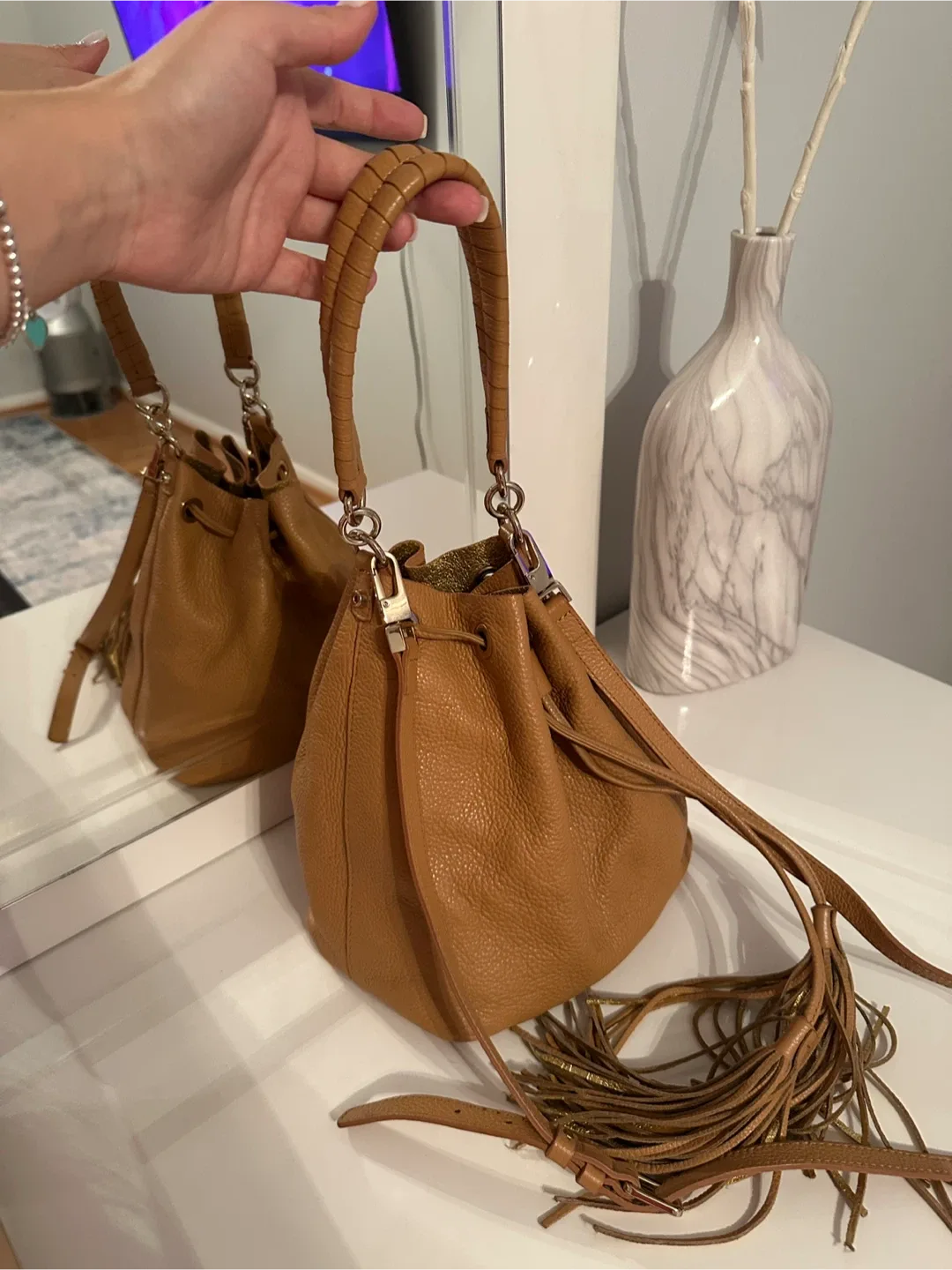 Tan Leather Bucket Bag with Tassels image indicator(9)