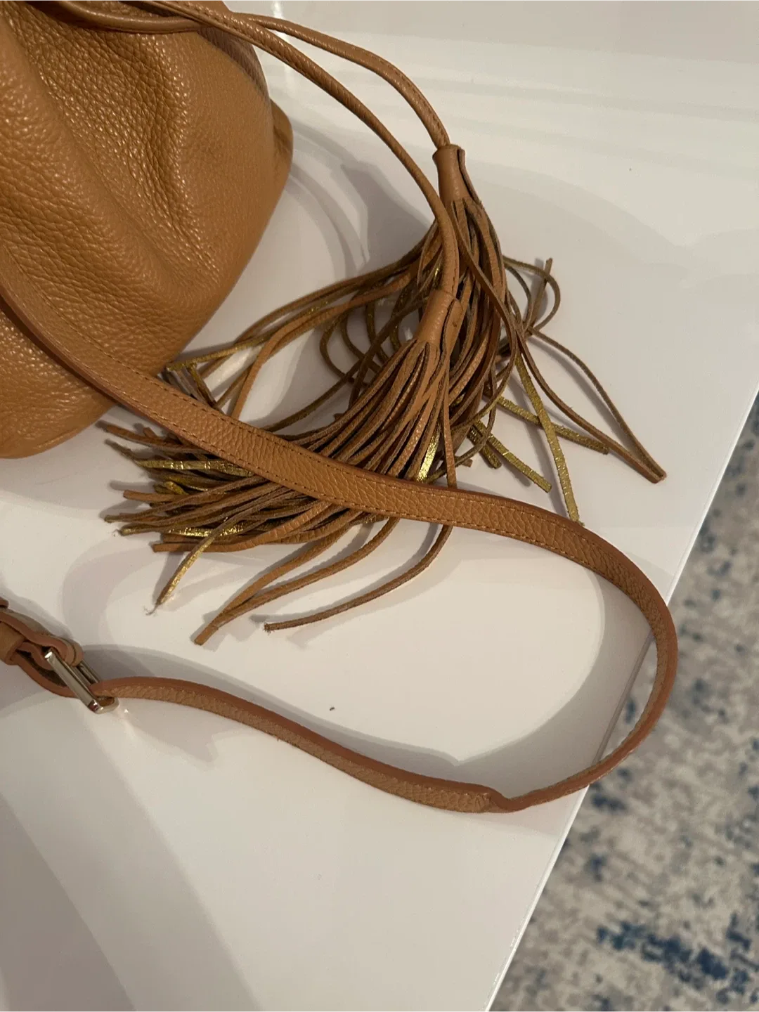 Tan Leather Bucket Bag with Tassels image indicator(8)
