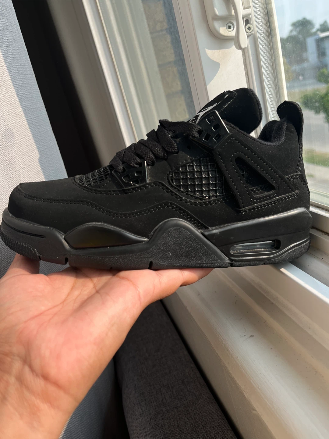 Jordan 4 Retro Black Cat