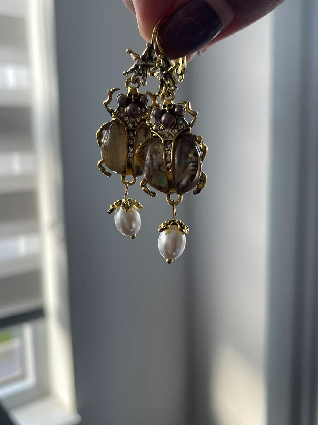 Egyptian Beetle Drop Earrings with pearl and rhinestone finish. image indicator(2)