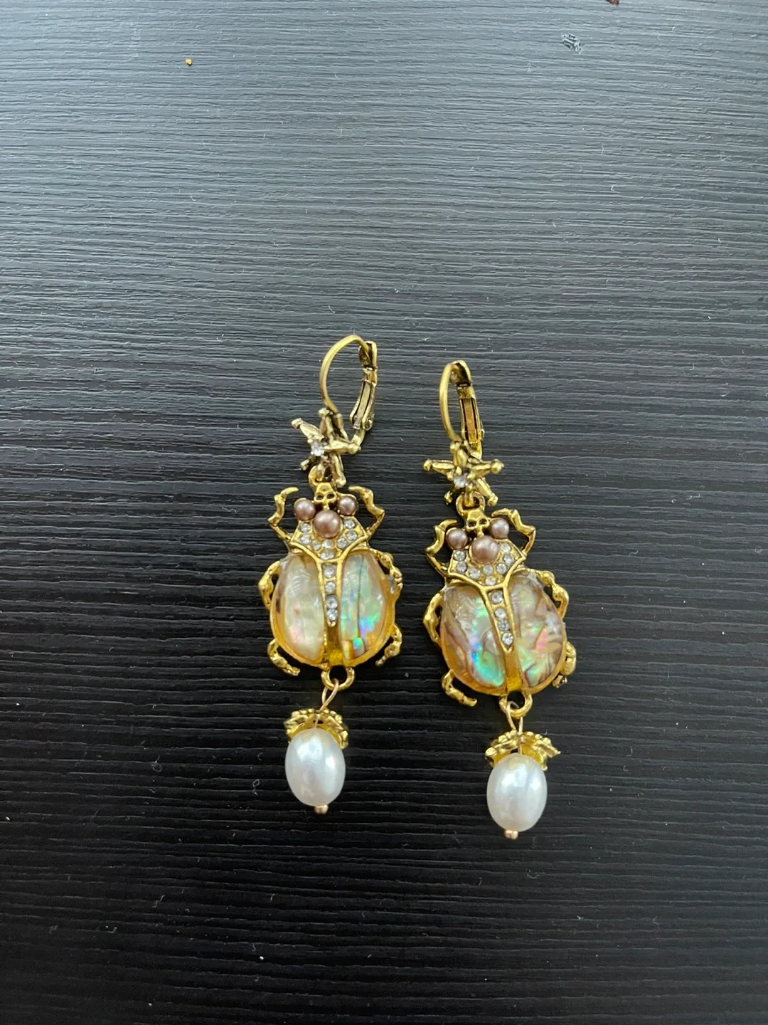Egyptian Beetle Drop Earrings with pearl and rhinestone finish.