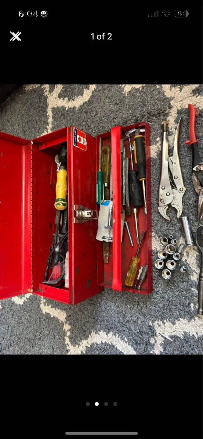 Red Metal Toolbox with Tools