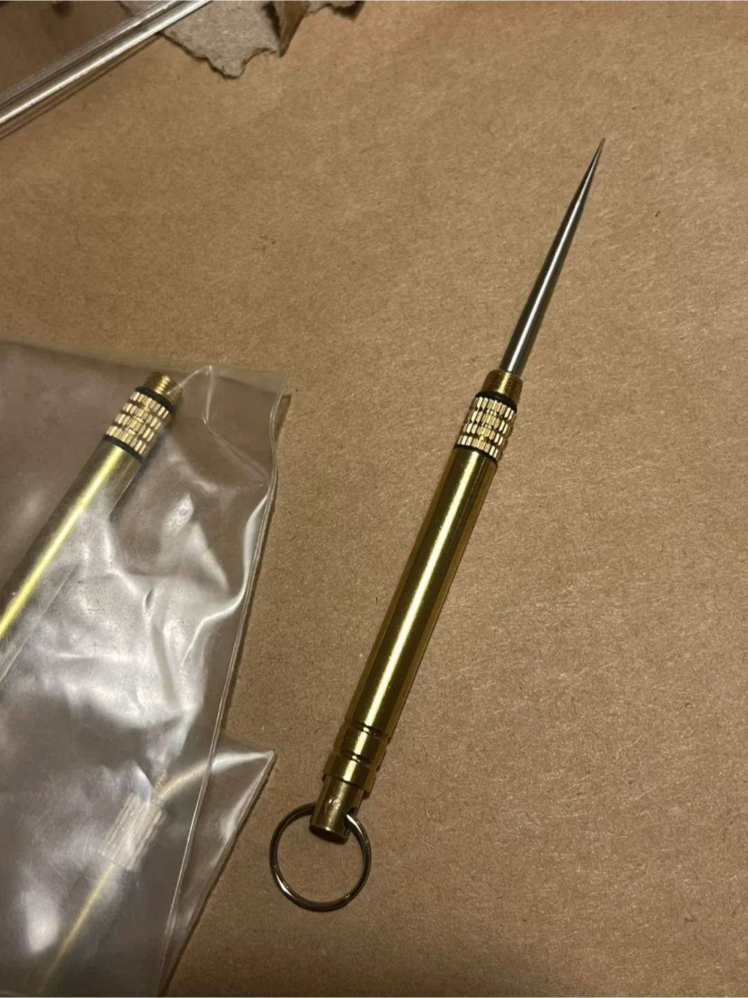 Discreet titanium “Toothpick” with keyring. Brand new. image indicator(2)