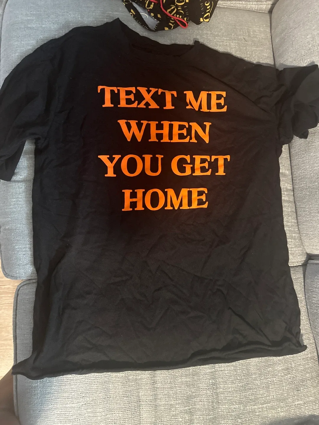 Black T-shirt with 'Text Me When You Get Home'