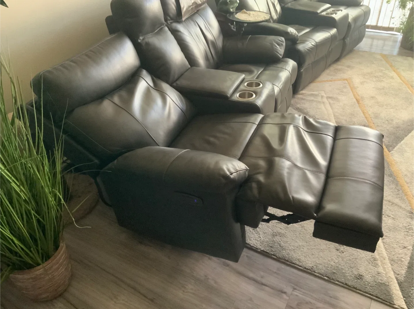 Dark brown Leather Reclining Loveseat with Console image indicator(5)