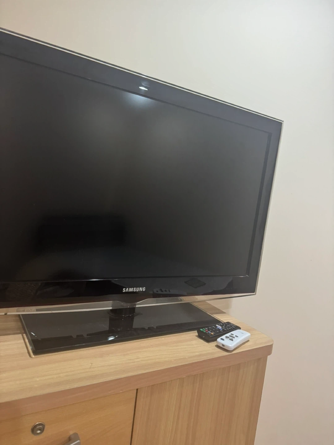 Samsung TV & Orange Shelf