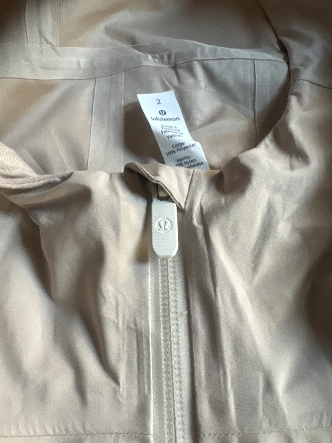 Lululemon Beige Rain Jacket - Size 2 image indicator(7)