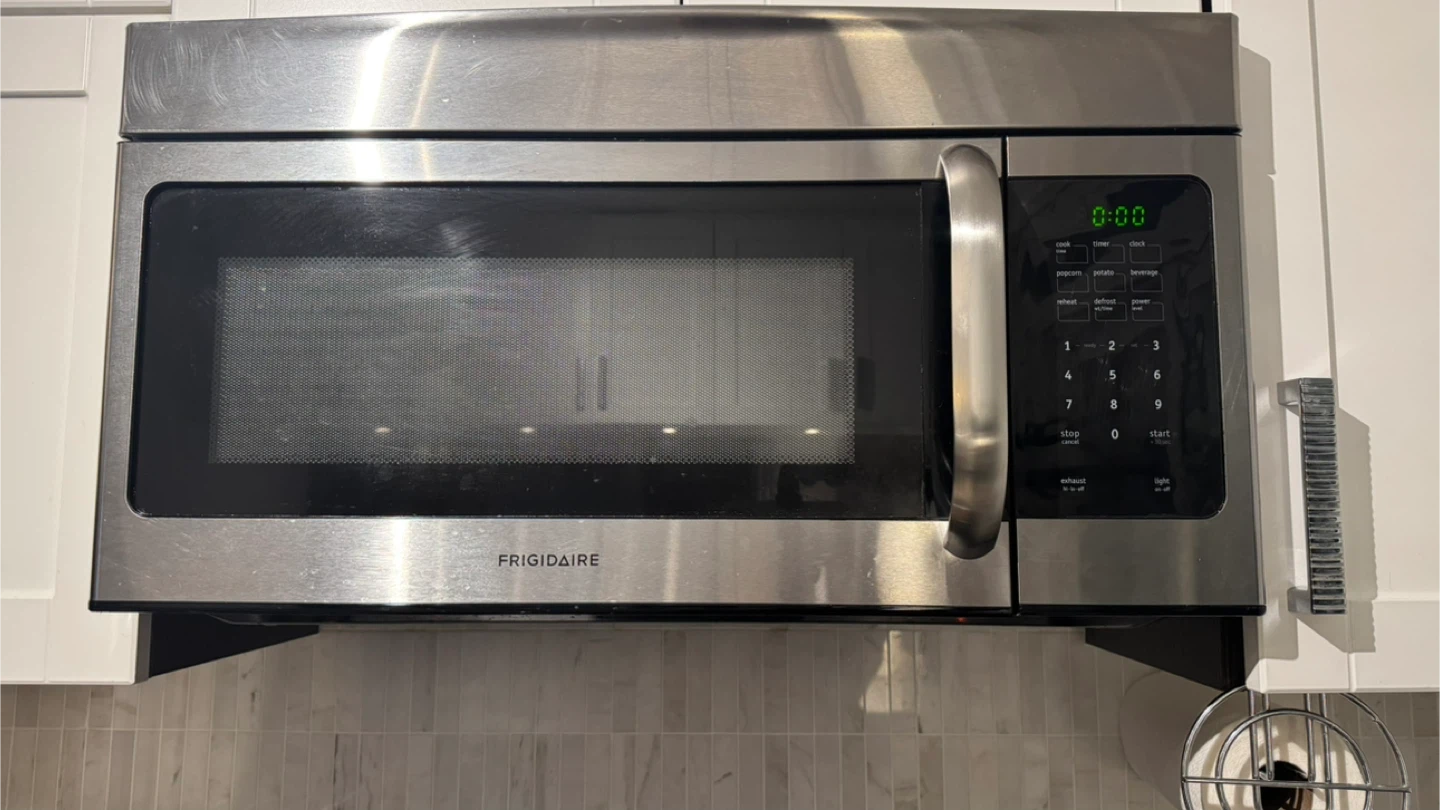 Moving sale❗️Frigidaire Stainless Steel Over-the-Range Microwave - photo 2