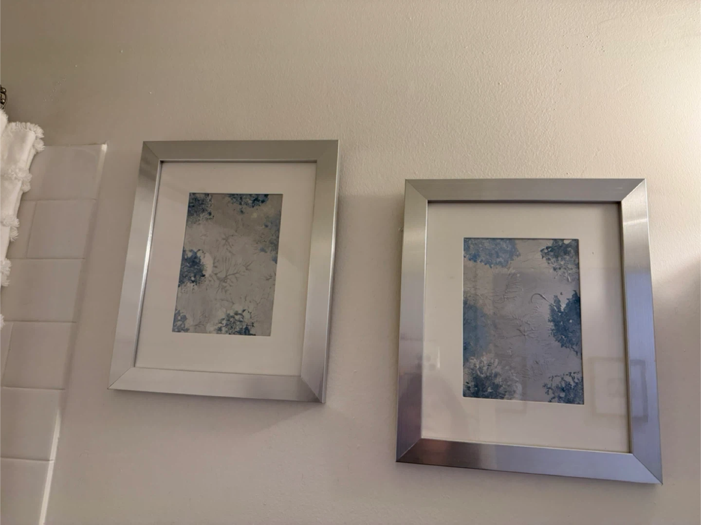 Must sell by Friday !  ! Silver Framed Wall Art - Set of 2