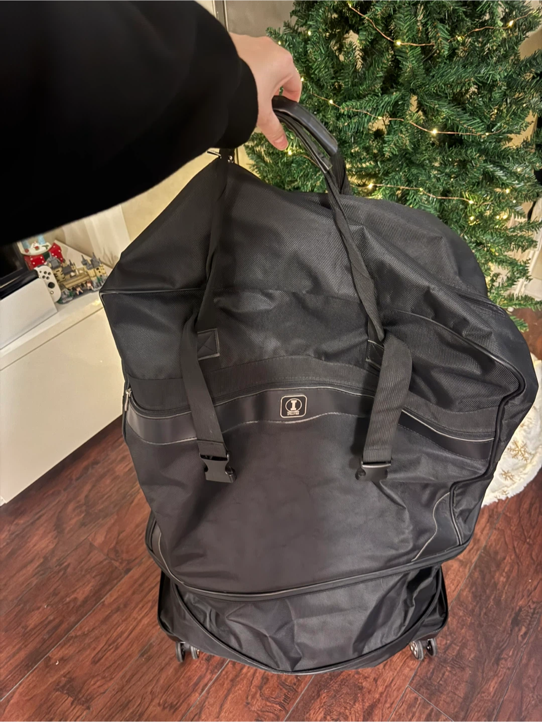 Upright Black Wheeled Duffel Bag