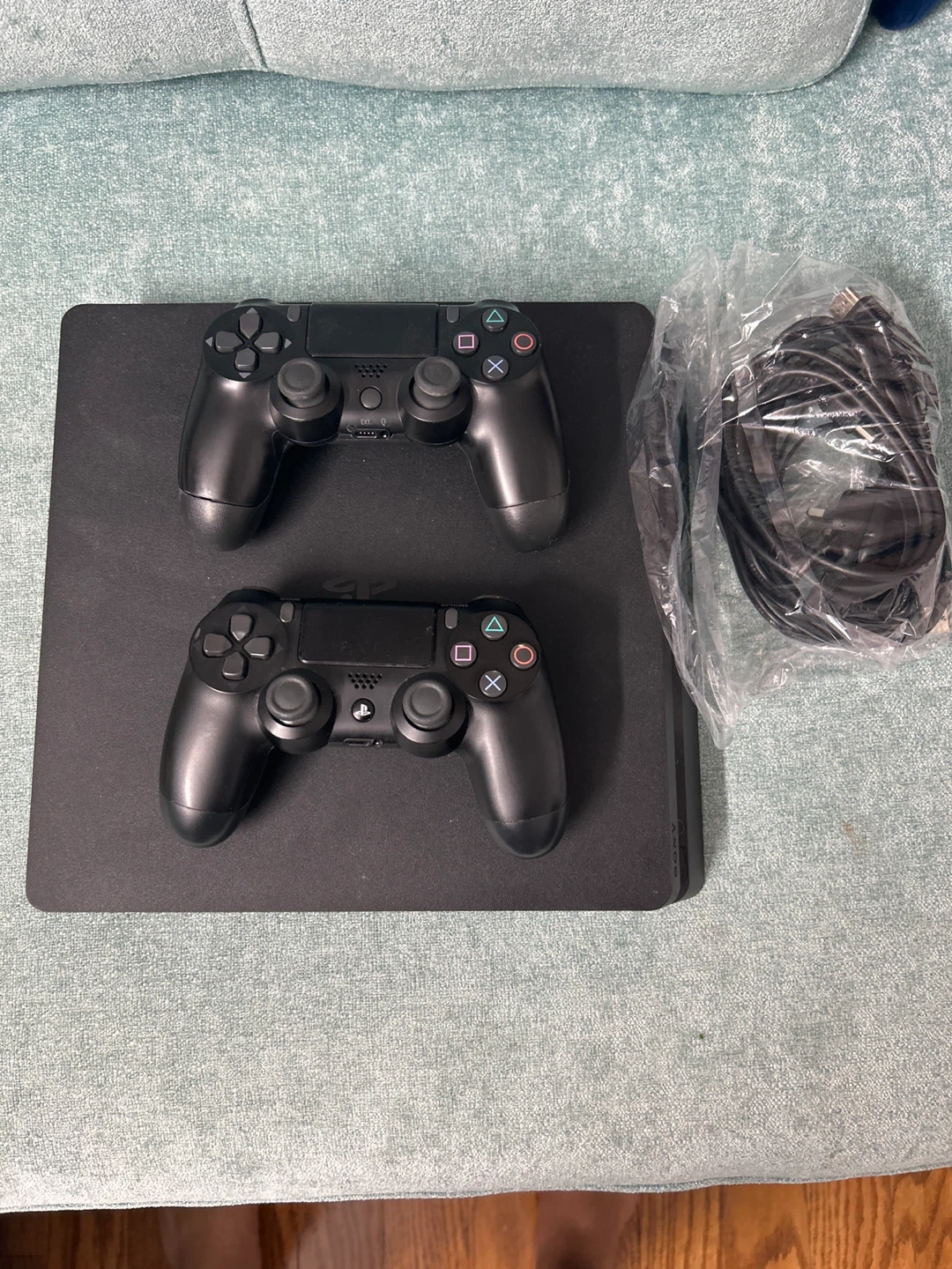 PlayStation 4 Slim with 2 Controllers
