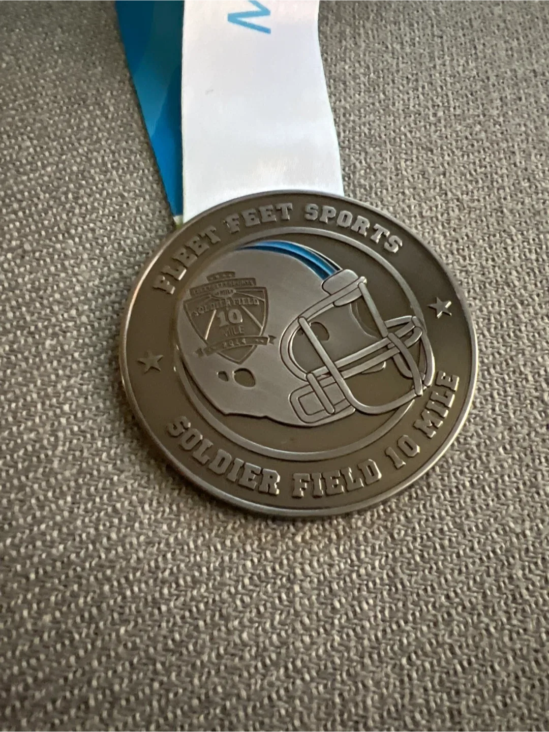 Fleet Feet Sports Soldier Field 10 Mile Finisher Medal image indicator(2)