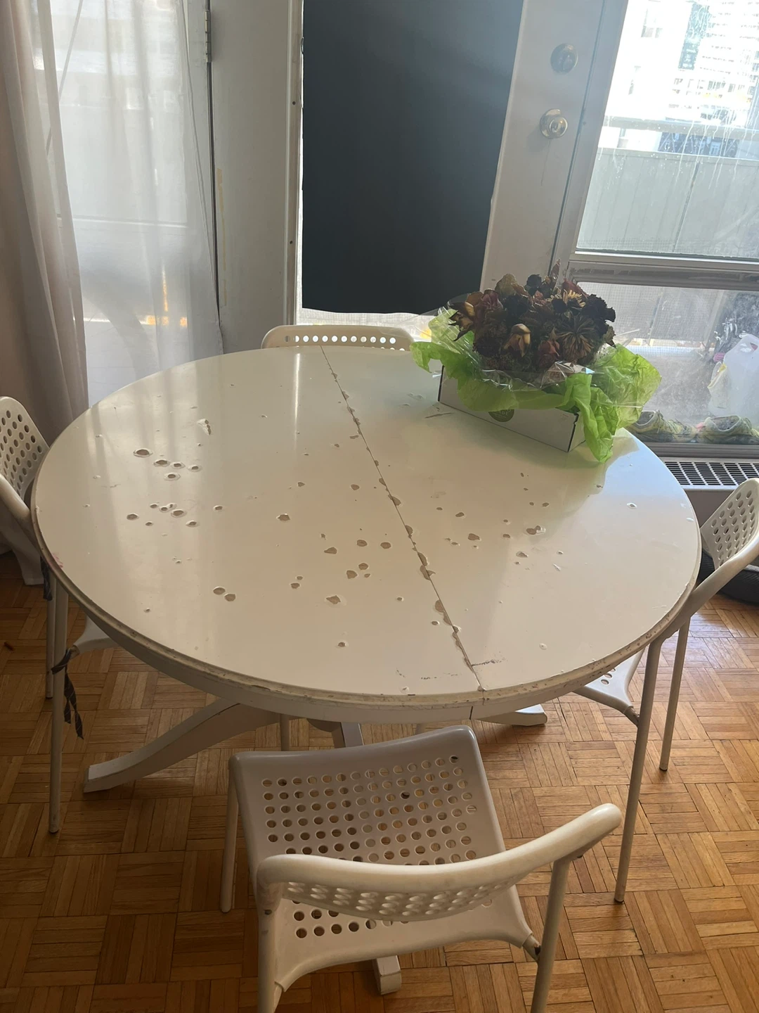 Round Extended White Dining Table with Chairs