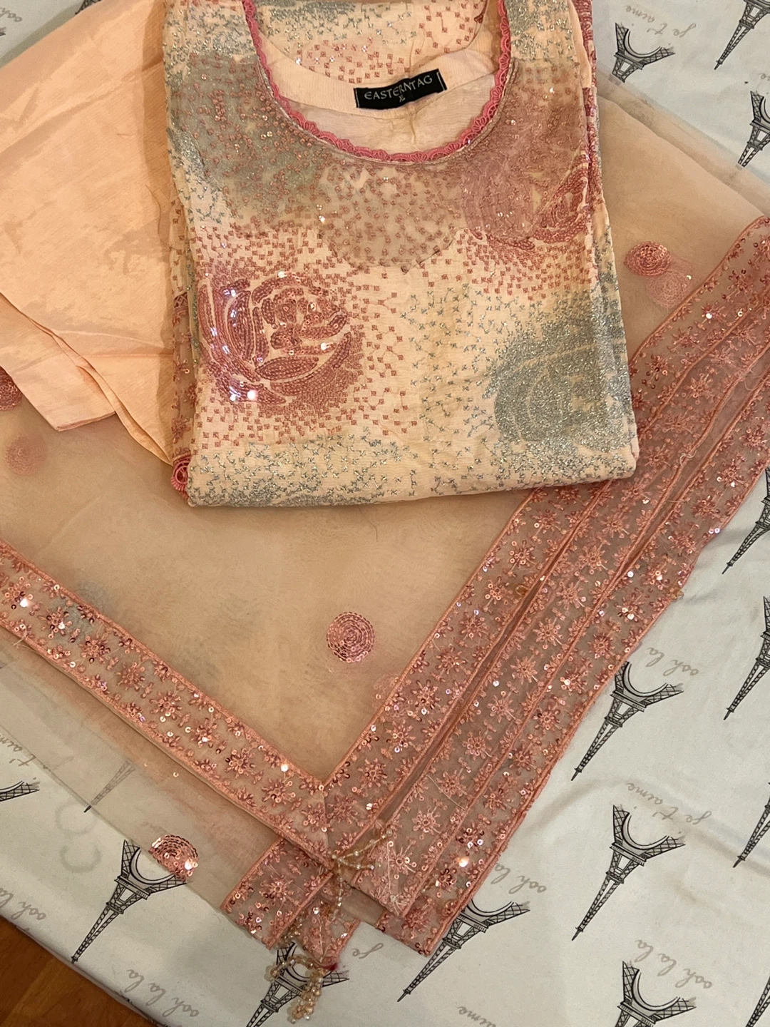 Beautiful Peach color Sequence work suit in XL