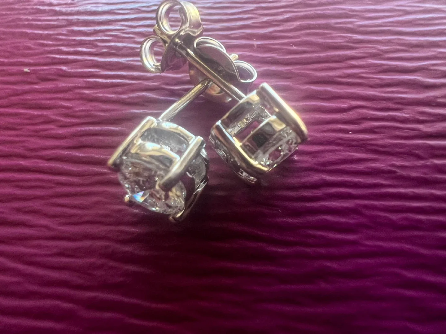 14 k diamond studs 0.80 CTW with an appraisal