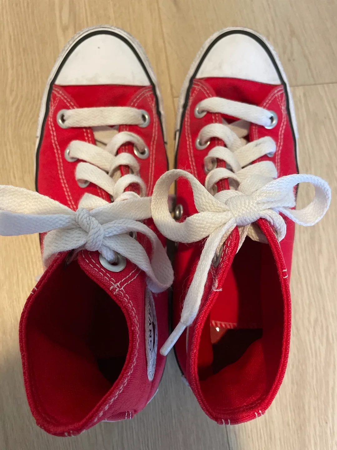 Red Converse Chuck Taylor by All Star High Tops image indicator(4)