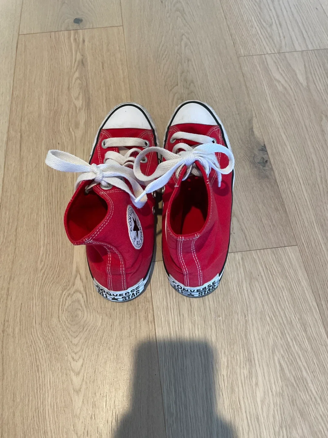 Red Converse Chuck Taylor by All Star High Tops image indicator(3)