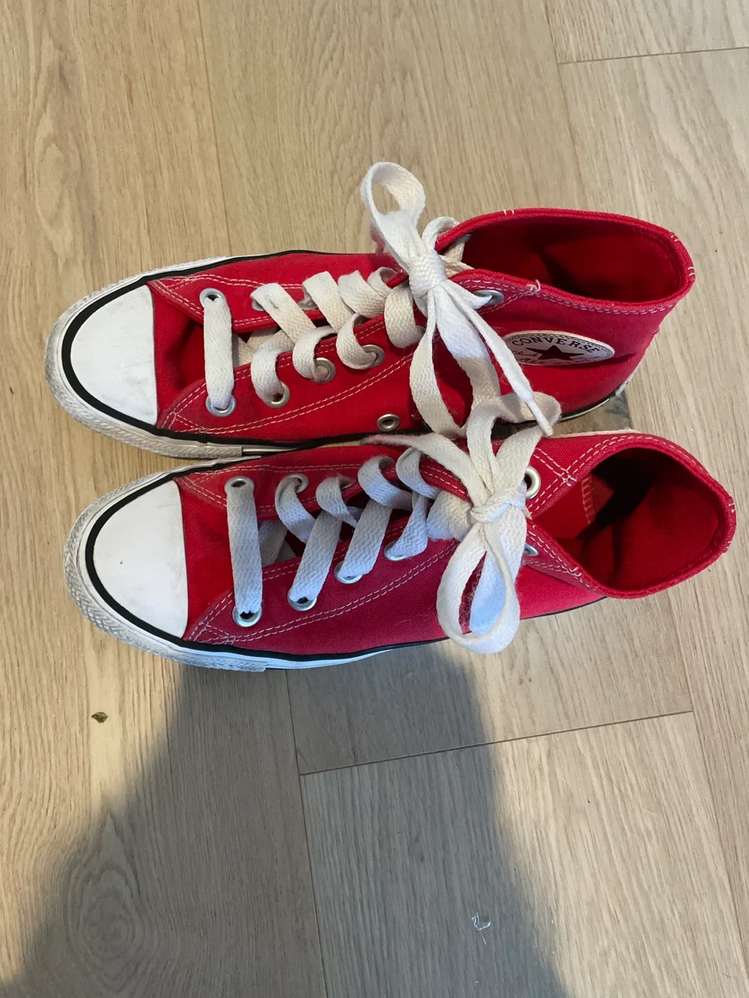 Red Converse Chuck Taylor by All Star High Tops image indicator(2)