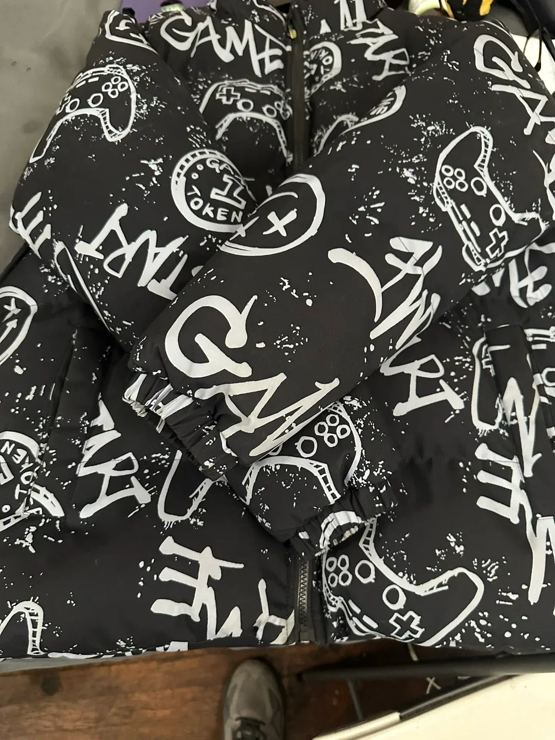 Black Puffer Jacket with Game Controller Print image indicator(3)