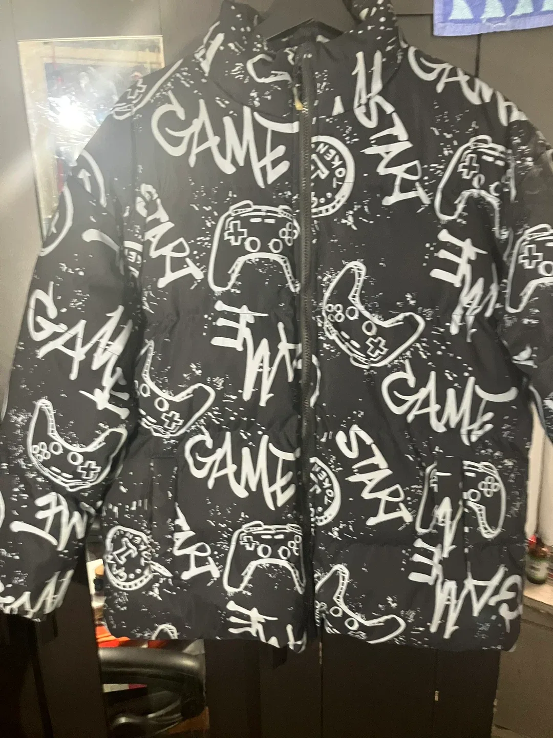 Black Puffer Jacket with Game Controller Print image indicator(5)