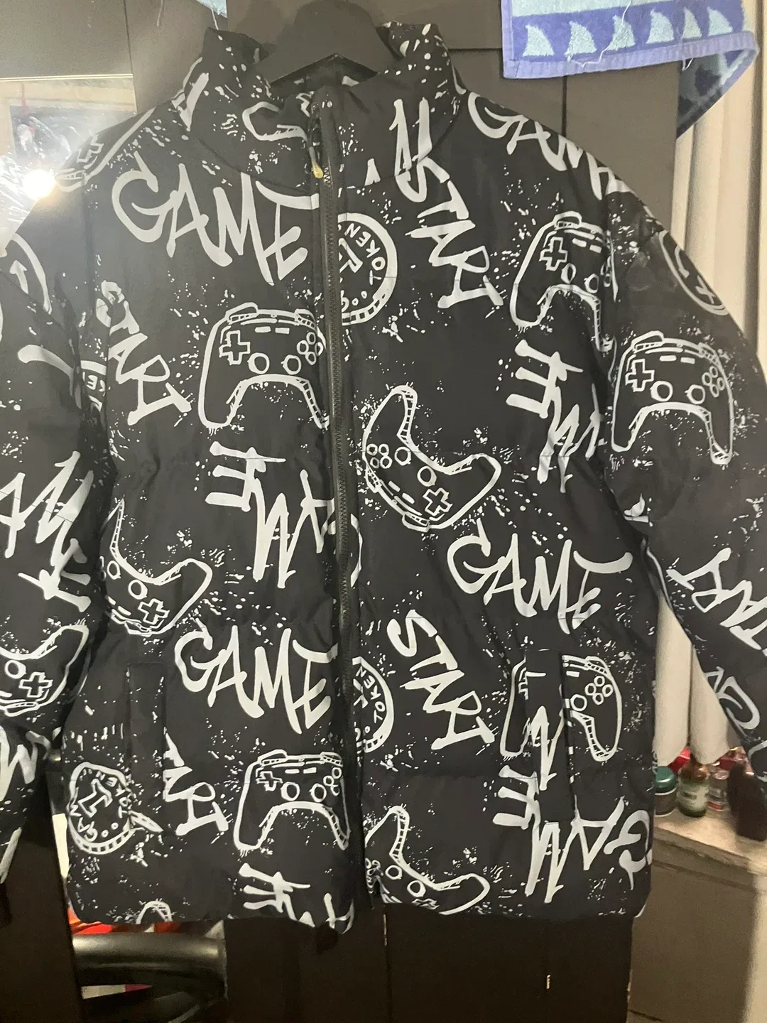 Black Puffer Jacket with Game Controller Print image indicator(7)