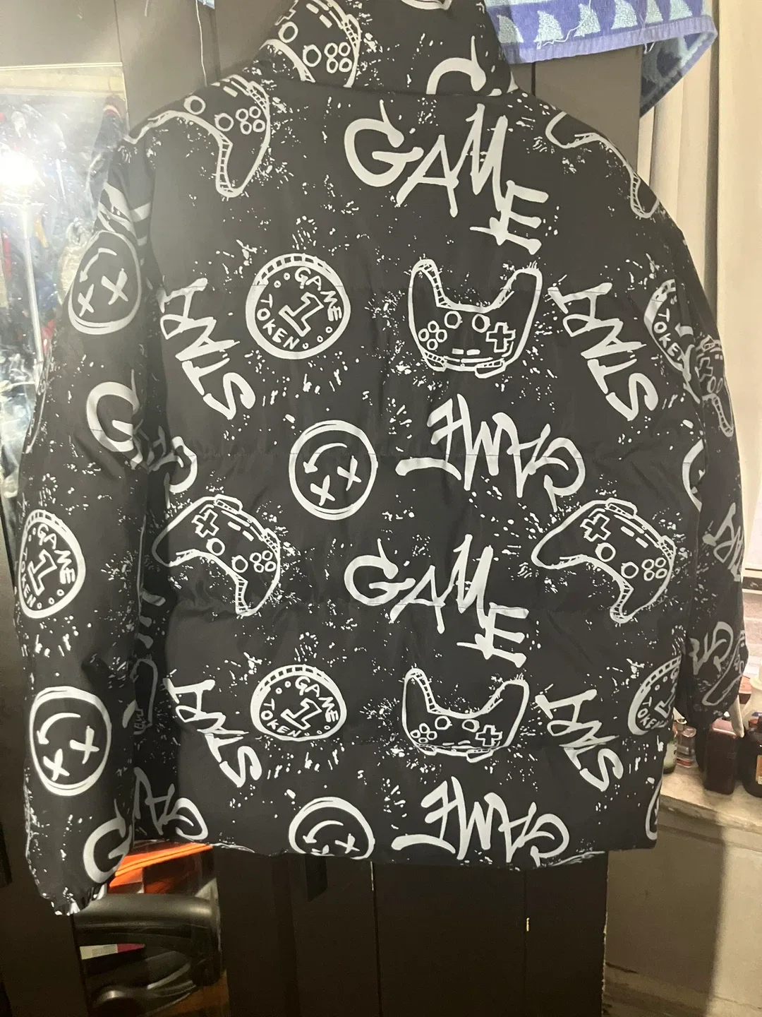 Black Puffer Jacket with Game Controller Print image indicator(10)