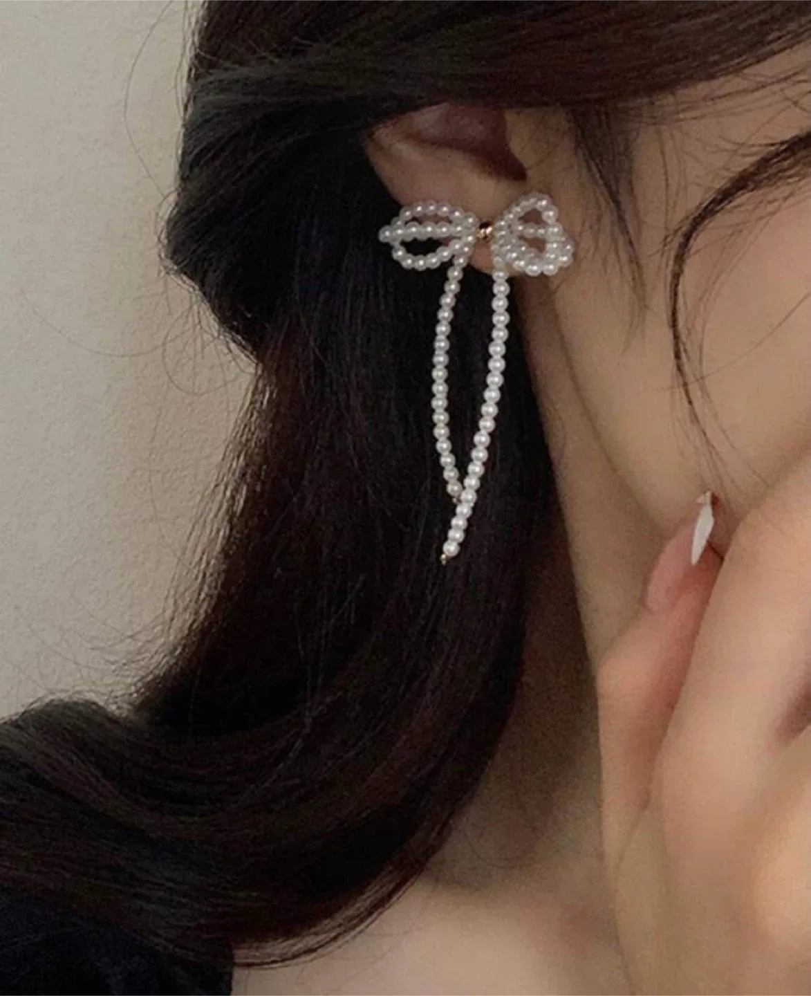 Bow & faux pearl earrings thumbnail