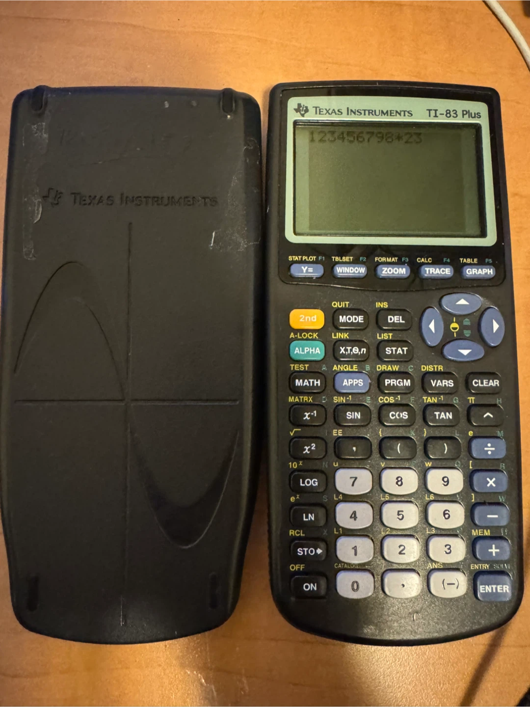 Texas Instruments TI-83 Plus Calculator include batteries
