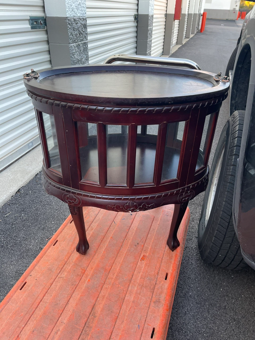 Vintage hand carved walnut cabinet with Oval tray top