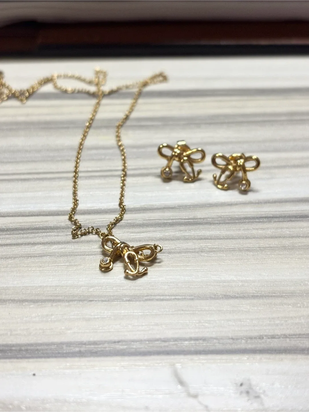 V Coterie Tiny Stethoscope Bow Necklace & Studs image indicator(2)