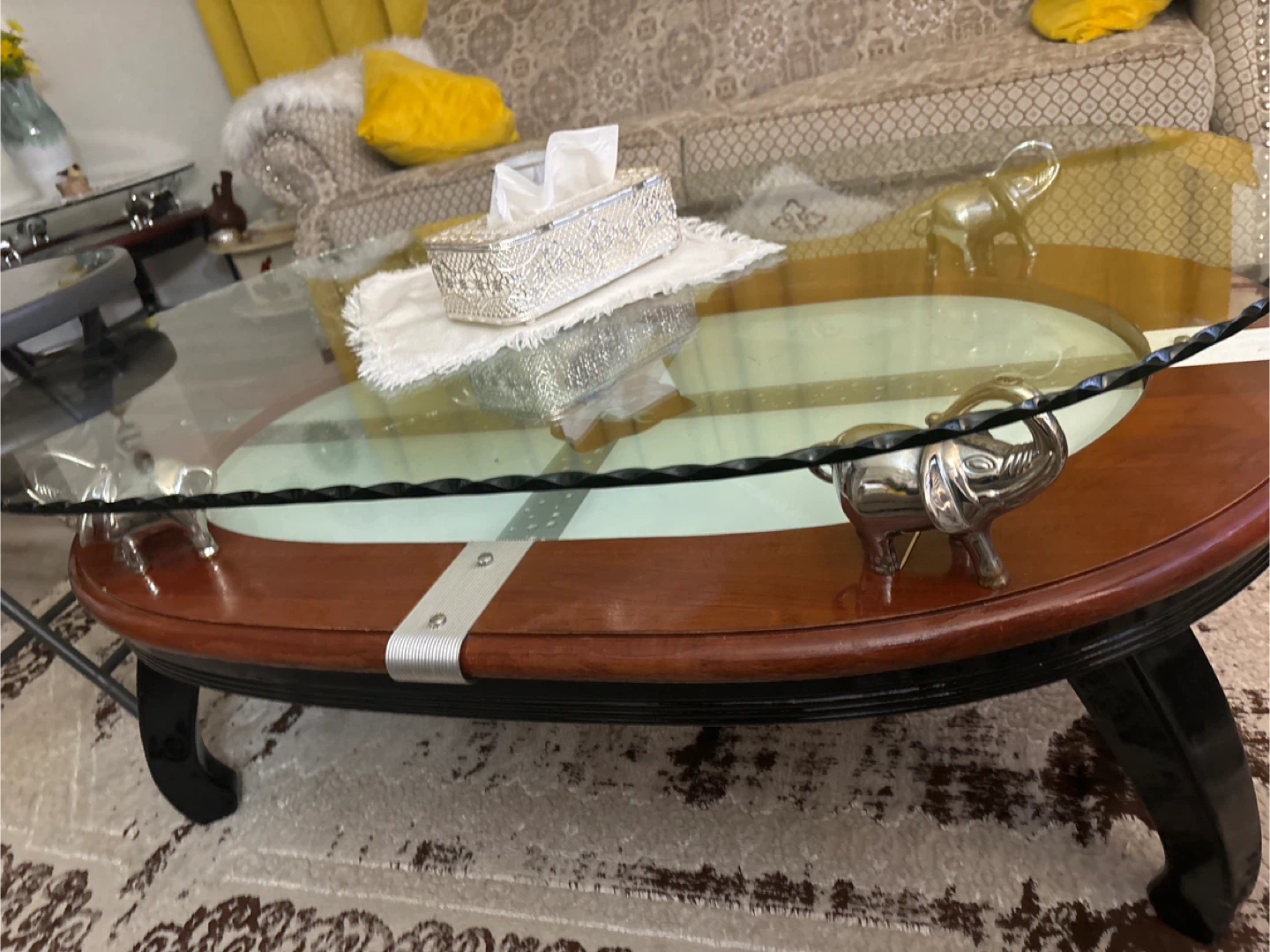 Glass Top Coffee Table with Elephant Accents