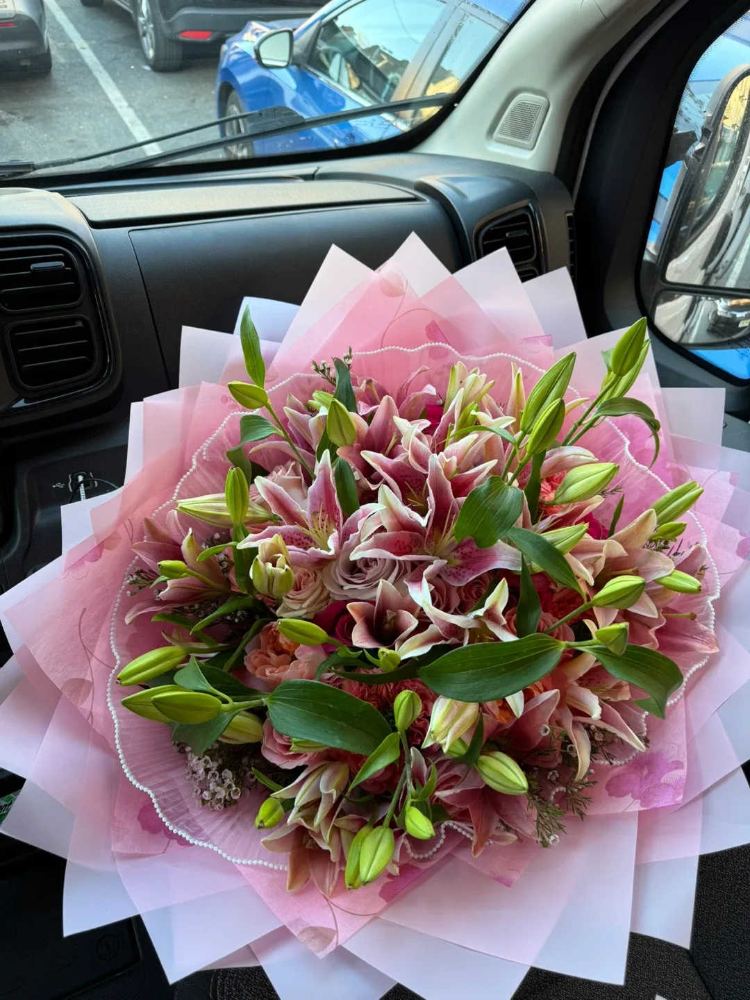 Pink lilies bouquet and roses. image indicator(2)