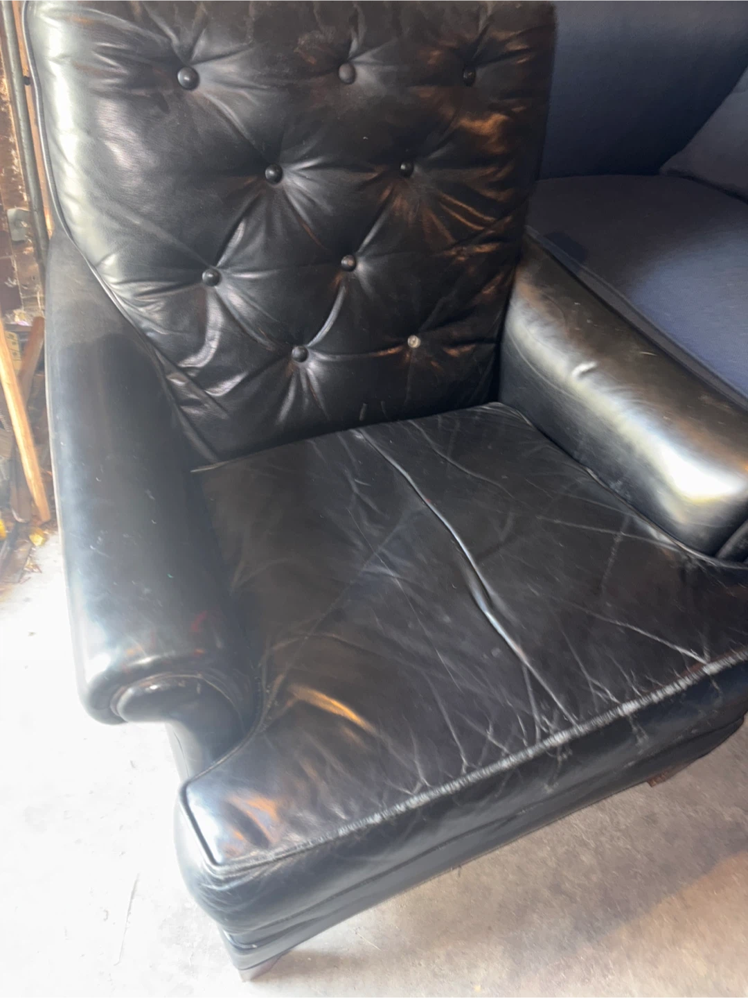 Dark blue Leather chair as seen in pictures